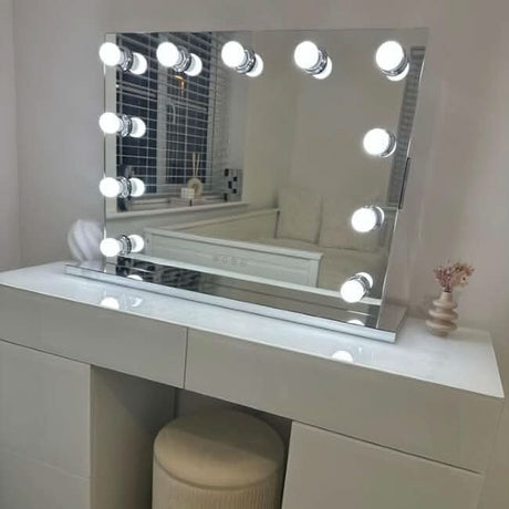 Hollywood Mirror with Bright LED Lights on a Stylish Vanity Table for Perfect Make-up Application