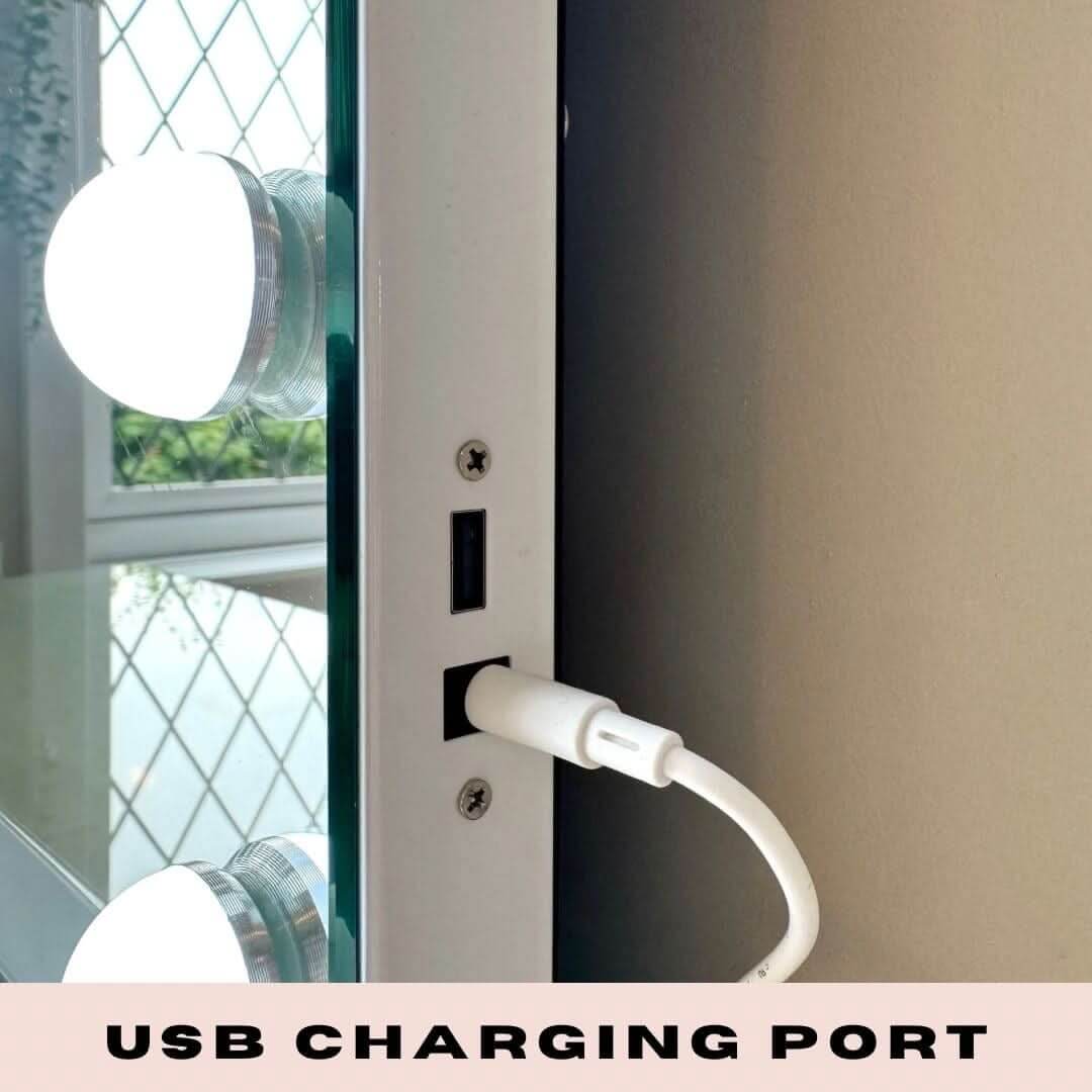 Close-up of a Hollywood Mirror USB charging port for convenient device charging