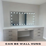 Hollywood Mirror with Bright LED Lights, Wall Hung Above Stylish Vanity Table with Drawers