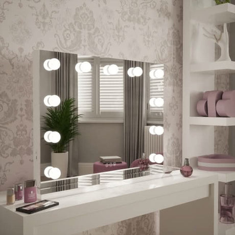 Stylish Hollywood Mirror with bright lights, perfect for makeup application in a chic setting