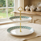 Elegant two-tier Cake Stand from KitchBoom with decorative blue pattern and gold handle