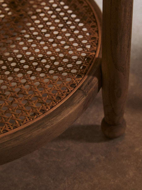Orsina side table with natural wood finish and woven rattan top, perfect for living spaces