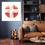 Modern wall art canvas with a red and white abstract design showcased in a stylish living room