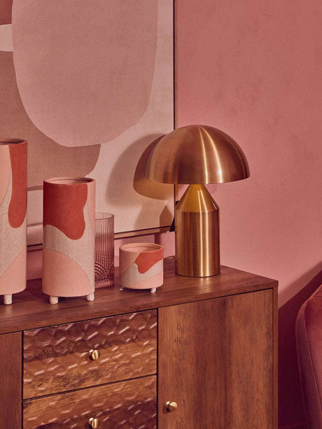 Stylish Orsina Wall Art displayed above a wooden cabinet with modern lamps and decorative vases