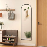 Modern Standing Mirror with a sleek black frame reflecting a stylish entryway decor