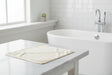 Eco Bath London Hooded Towel on a marble bathroom counter, perfect for after bath comfort