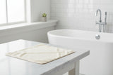 Eco Bath London Hooded Towel on a marble bathroom counter, perfect for after bath comfort