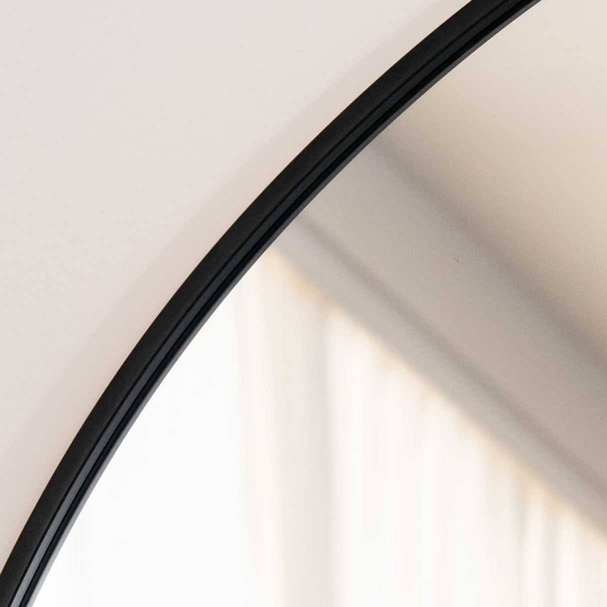 Jobu Home Arched Mirror with a Black Frame, ideal for enhancing any living space