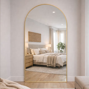 Jobu Home Arched Mirror with Gold Frame, ideal for enhancing bedroom decor and light reflection
