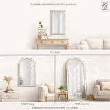 Jobu Home Arched Mirror displayed in portrait and wall leaner orientations in a stylish living room