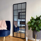 Jobu Home Grid Mirror with a sleek black frame, perfect for modern home decor and enhancing living spaces