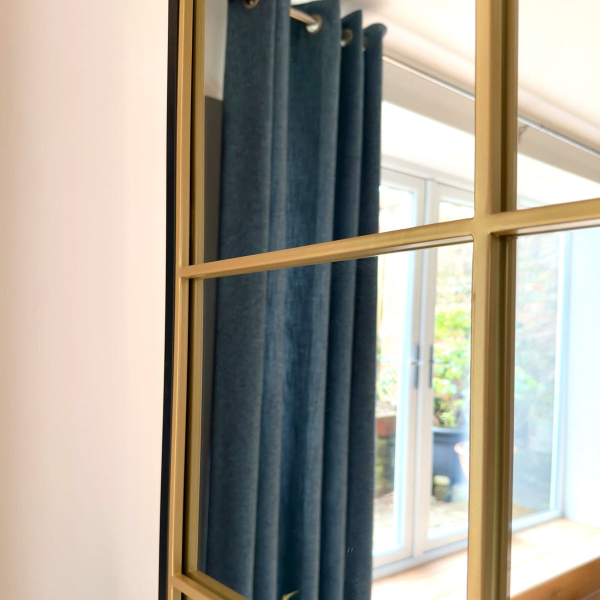 Jobu Home Grid Mirror featuring a sleek gold frame ideal for stylish home decor