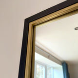 Elegant Jobu Home Grid Mirror with a black and gold frame, perfect for modern interiors