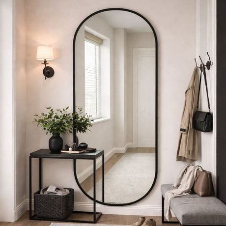 Elegant Jobu Home Oval Mirror in a stylish black frame for modern home decor