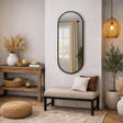 Stylish Oval Mirror in Black Frame, Perfect for Home Decor in Modern Living Spaces