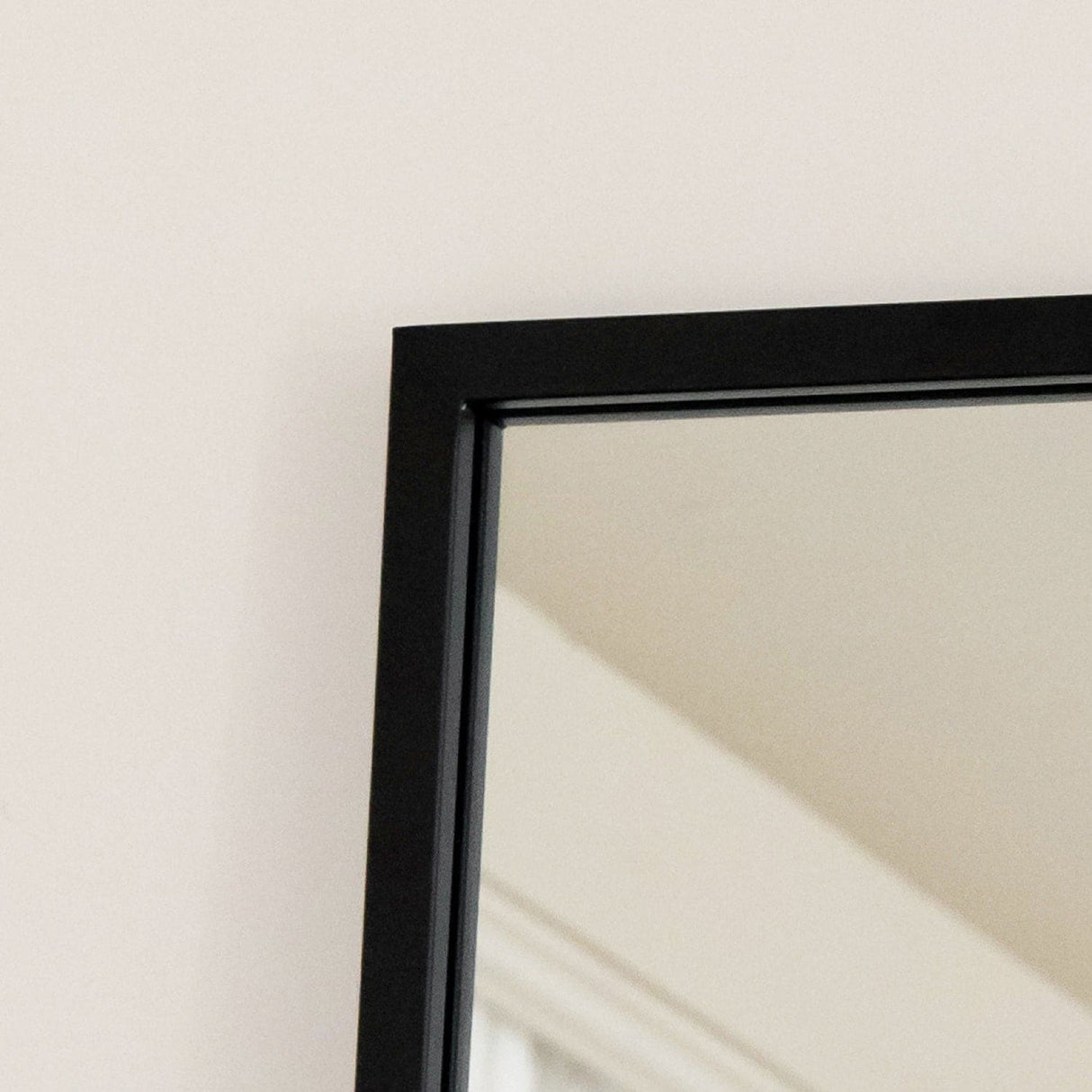Sleek Rectangle Mirror by Jobu Home with a minimalist black frame for stylish home decor