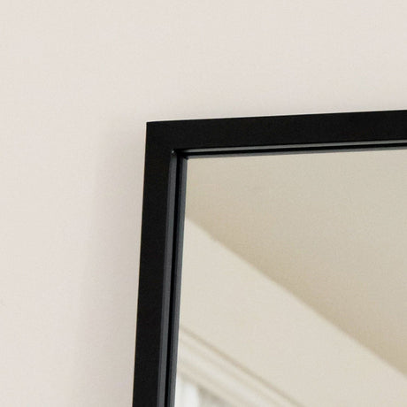 Sleek Rectangle Mirror by Jobu Home with a minimalist black frame for stylish home decor