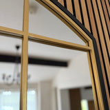 Jobu Home Window Mirror with a Stylish Golden Frame and Elegant Design