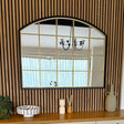 Jobu Home Window Mirror with an Arched Design and Gold Framed Grid on a Wooden Wall