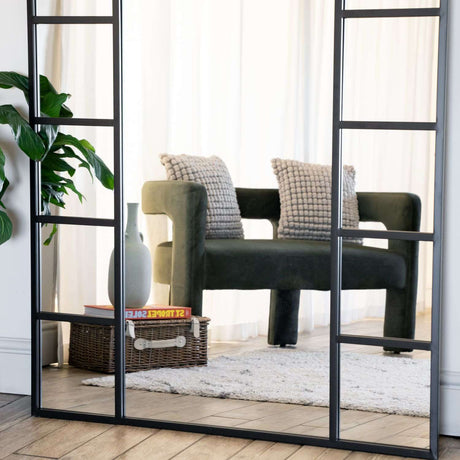 Stylish Jobu Home Window Mirror with Black Frame Reflecting a Modern Living Space