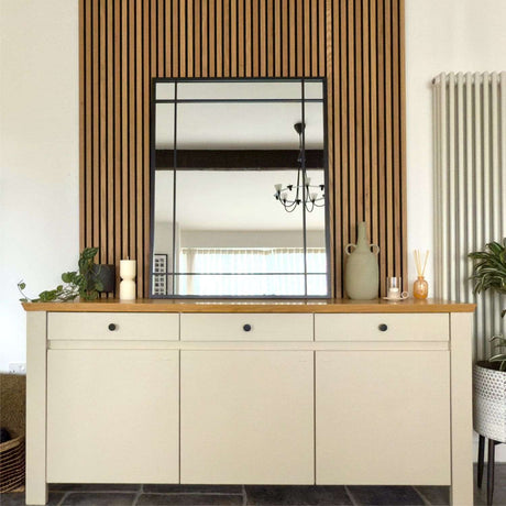Jobu Home Window Mirror above a stylish sideboard with wooden accents in a modern interior