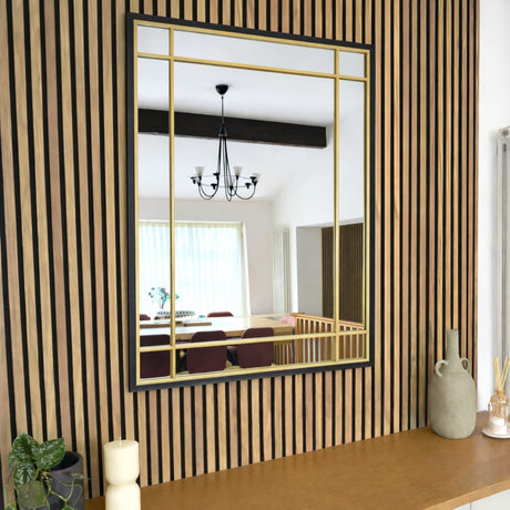 Stylish Jobu Home Window Mirror with a gold frame perfect for modern interiors