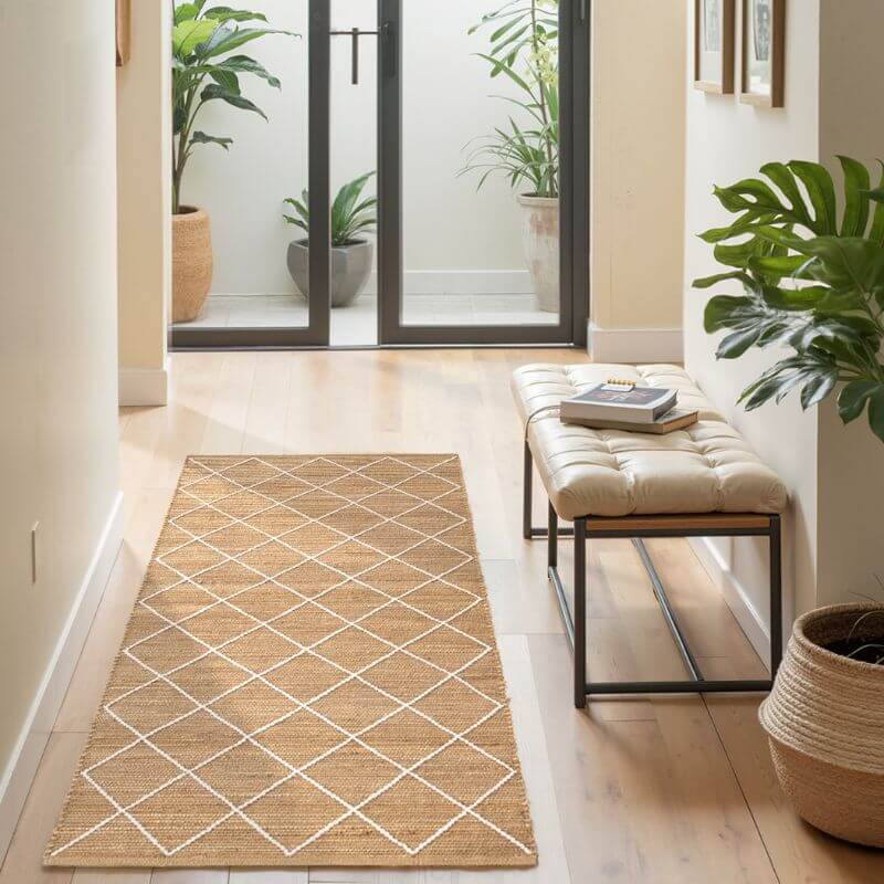 Elegant Jute Rug with diamond patterns in a hallway, enhancing home decor