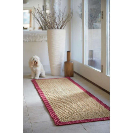 Natural fibre Jute Rug with a vibrant pink border, perfect for entryways and living spaces