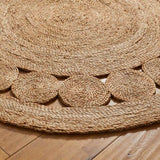 Handwoven Round Jute Rug with Circular Patterns for Natural Home Decor