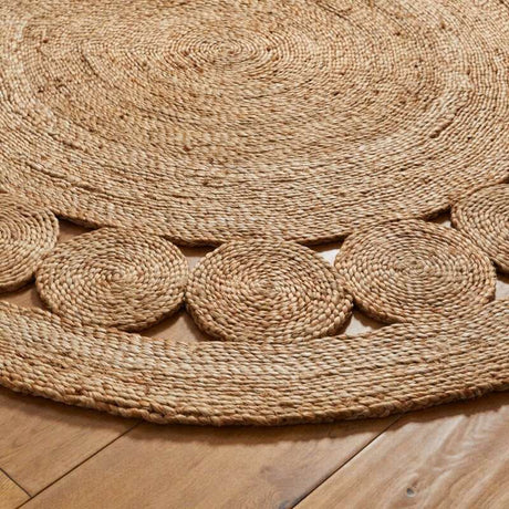 Handwoven Round Jute Rug with Circular Patterns for Natural Home Decor