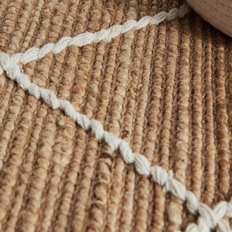 Natural Jute Rug with a Textured Weave and Complementary White Cotton Stripes