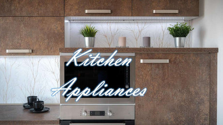 Modern kitchen with stylish grey storage, featuring an Electric Kettle on a countertop