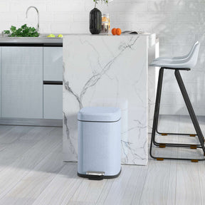 Stylish blue Kitchen Bin with pedal for easy waste disposal in modern kitchen setting