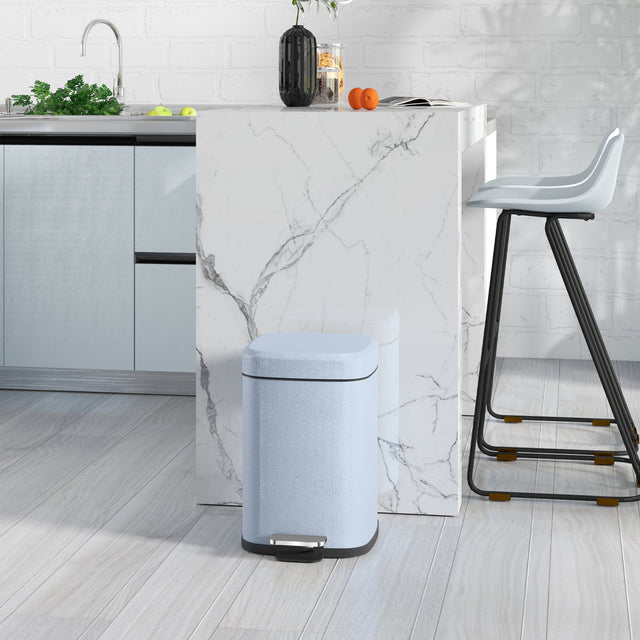 Stylish blue Kitchen Bin with pedal for easy waste disposal in modern kitchen setting