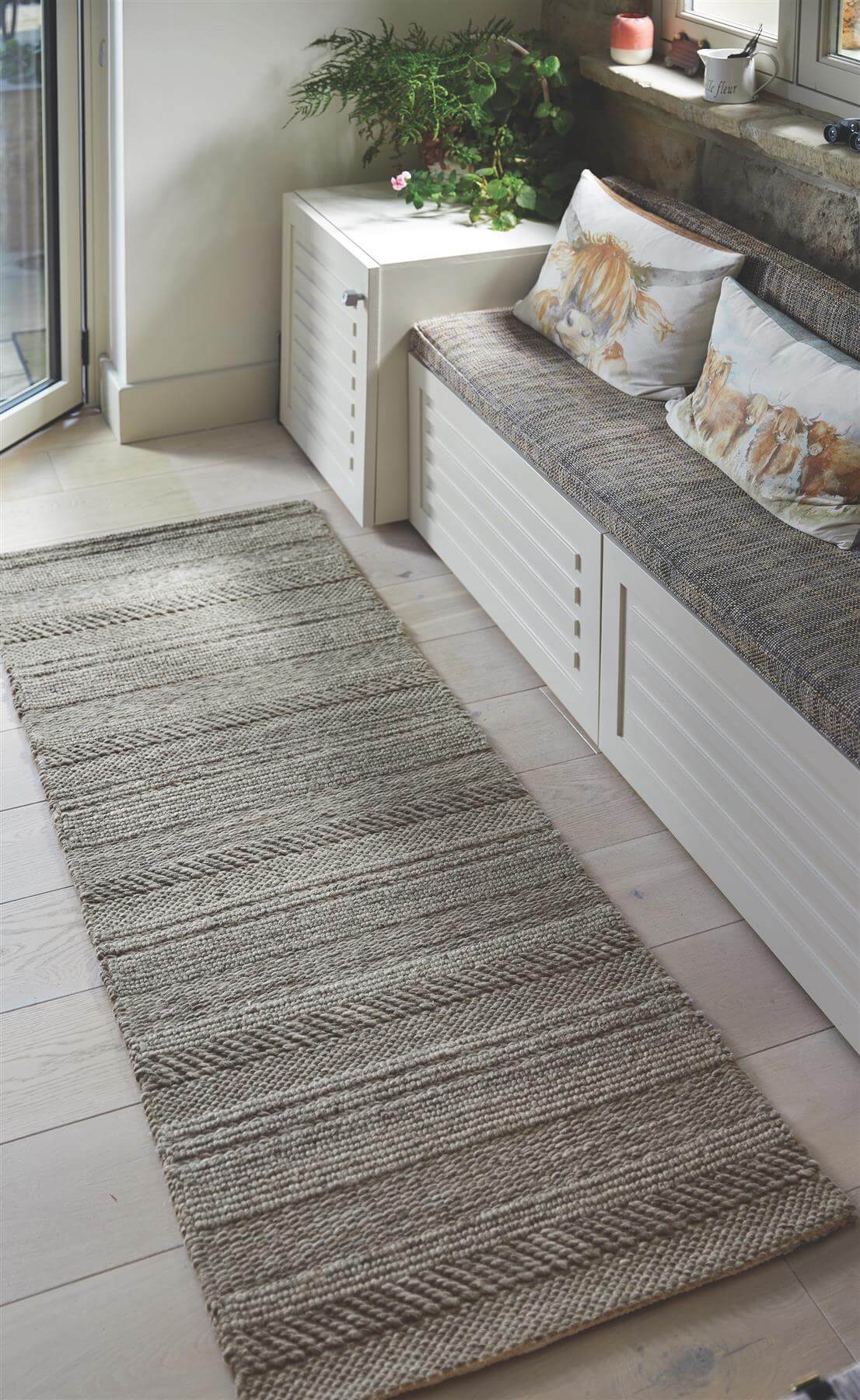 Stylish Knitted Rug in Natural Tones, Perfect for Adding Warmth to Any Room