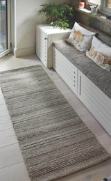 Stylish Knitted Rug in Natural Tones, Perfect for Adding Warmth to Any Room