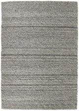 The Rugs Knitted Rug in grey with a textured, woven pattern for modern home decor