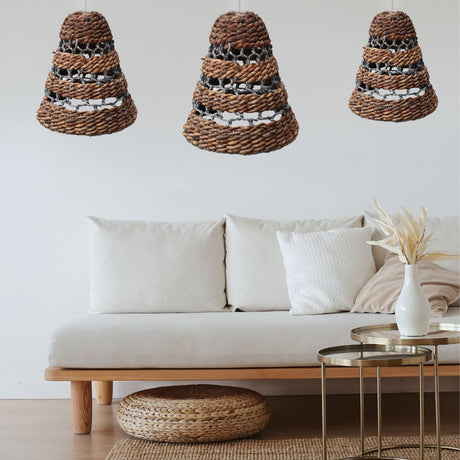 Natural Banana Leaf and Hitam Raffia Lamp Shades in a modern living room setting