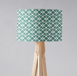Shadow Bright stylish green patterned lampshade on a wooden tripod lamp base