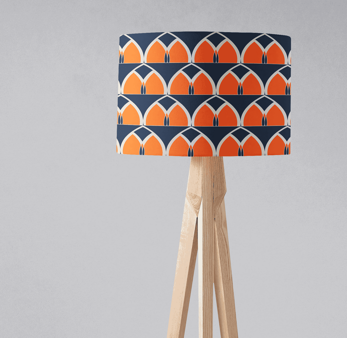 Shadow Bright lampshade featuring a modern pattern of orange and navy blue arches