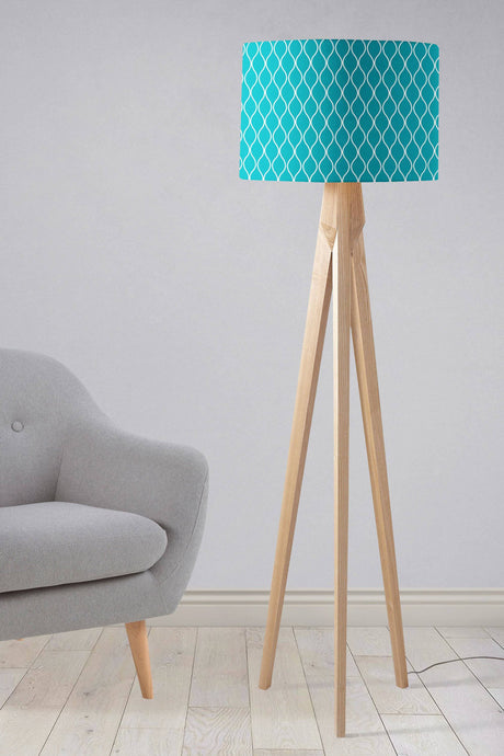 Stylish Shadow Bright lampshade in turquoise with geometric pattern on a tripod floor lamp