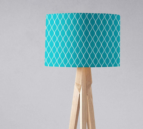 Vibrant turquoise lampshade with a geometric pattern, suitable for modern home decor