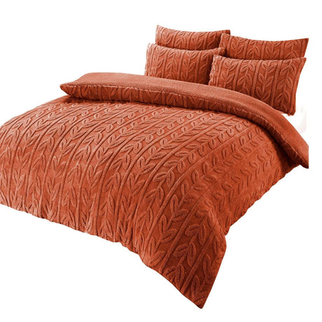 OLIVIA ROCCO Fleece Duvet Set in warm terracotta with textured leaf pattern and matching pillows