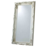 Elegant Leaner Mirror with ornate white frame, perfect for adding sophistication to any room