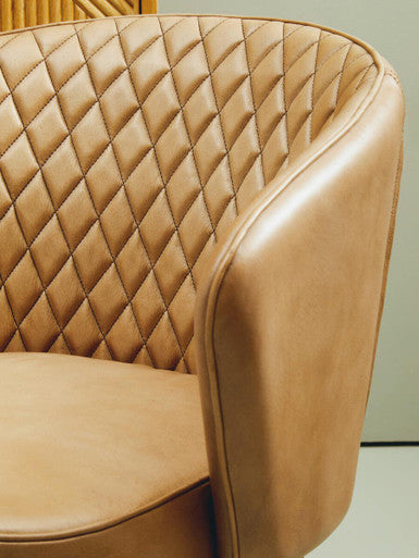 Orsina Leather Chair with Diamond Quilted Design and Curved Backrest for Stylish Comfort
