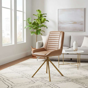 Orsina Leather Chair with Modern Lines and Stylish Gold Legs in a Bright Living Room Setting