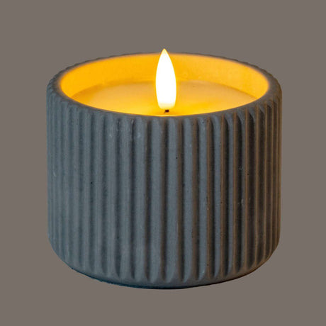 Shades 4 Seasons LED Candle in a textured grey holder for a warm and inviting ambiance