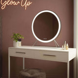 Hollywood Mirrors LED Mirror with Round Design and Adjustable Brightness on a Stylish Dressing Table