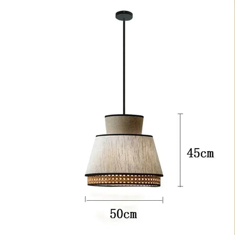 Nisu Home Light Pendant in a modern design featuring a textured shade and woven base