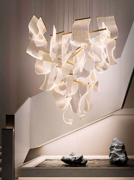 Elegant Nisu Home Light Pendant featuring flowing design with warm illumination in modern interior